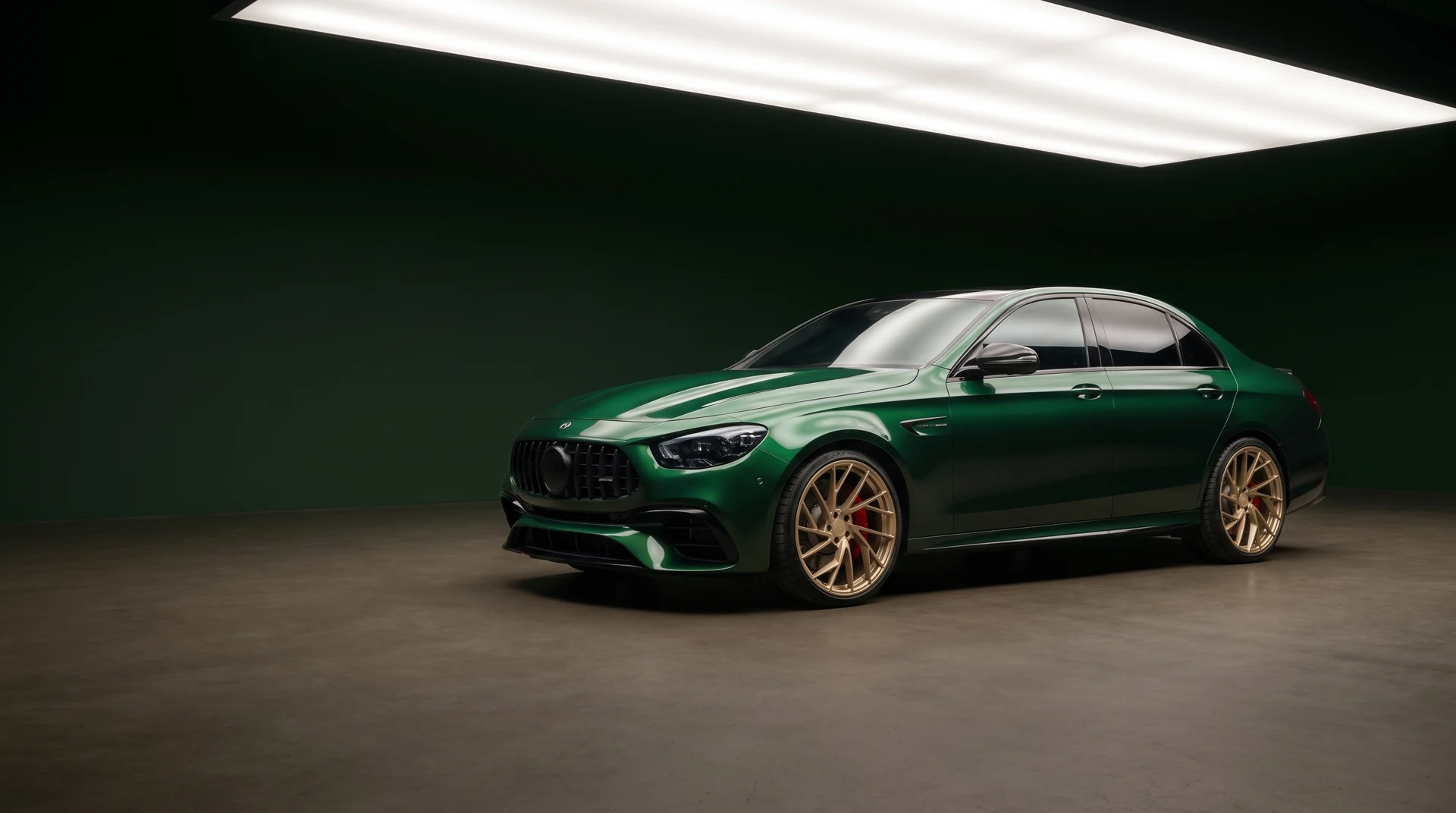 Green Mercedes shown from above and front three-quarter view